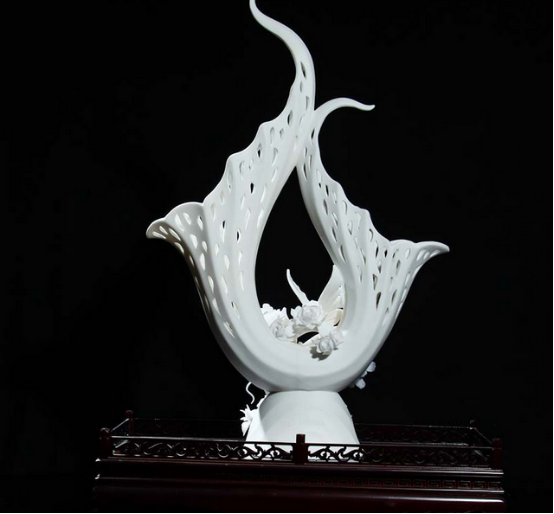 郑雄彭 瓷器 《凤飞蝶舞》.jpg