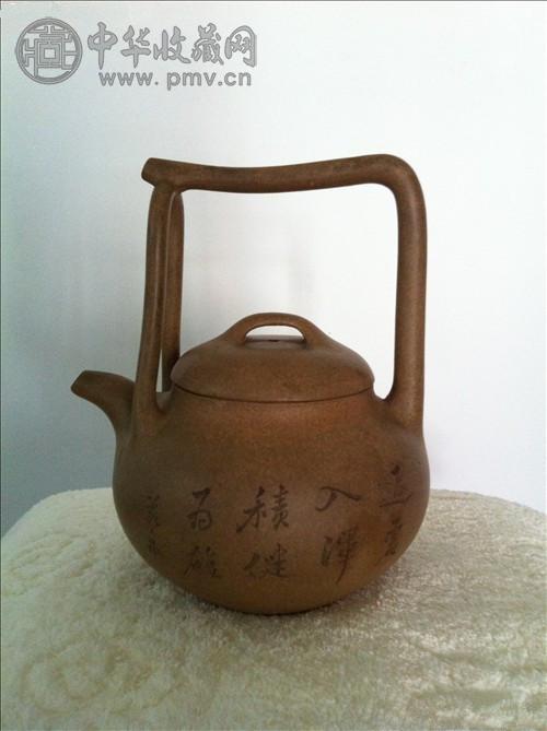 若泉铭段泥东坡提梁壶.jpg