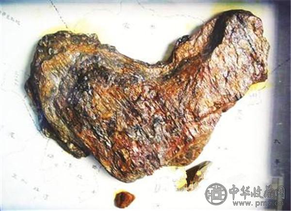 渔民家里现奇石 像中国版图乃天然艺术品.jpg 渔民家里现奇石 像中国版图乃天然艺术品.jpg