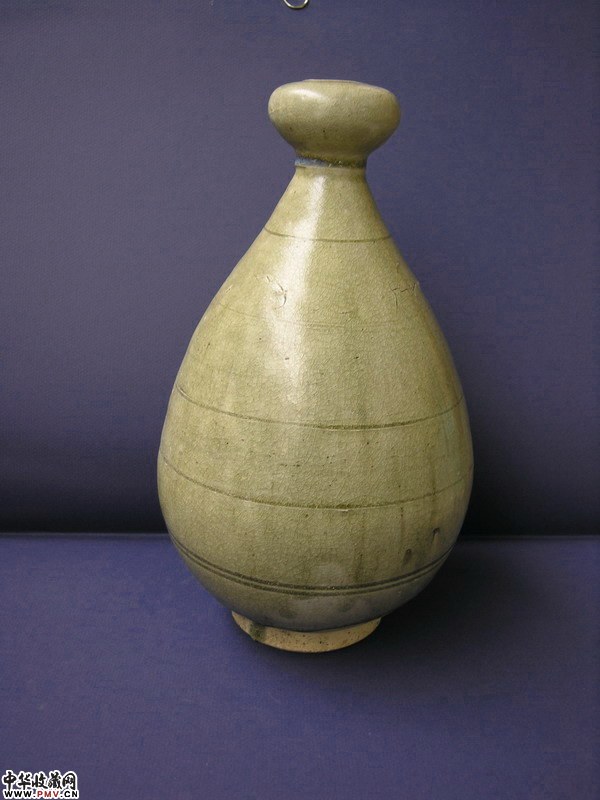 隋代青釉蒜头瓶。私人藏,非卖品。 隋代青釉蒜头瓶。私人藏,非卖品。