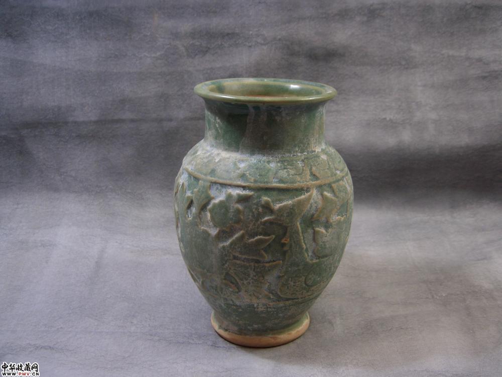 唐五代耀州窑剔花鸟纹瓶