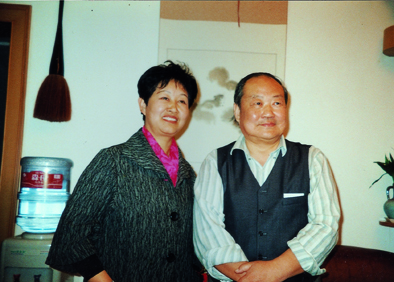 与著名画家李自强合影