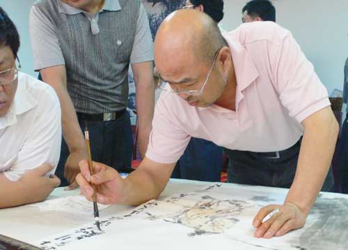 著名画家梁占岩现场创作
