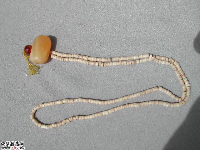新石器时期鸡骨白代有黄玉勒子的项链