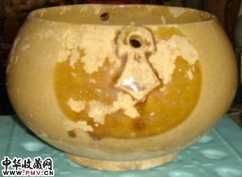 唐中期长沙窑釉下褐斑方形圆孔圭头形双系洗