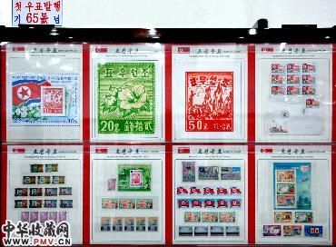 新华社照片，平壤，2011年3月9日，朝鲜举行邮票展