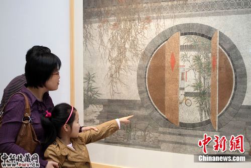 北京画家李强的一幅《家园》,备受观者喜爱。李克祥 摄