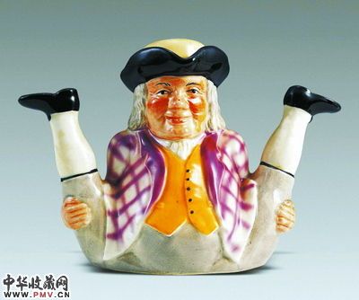 彩绘人物造型茶壶,英国斯塔福德郡。
