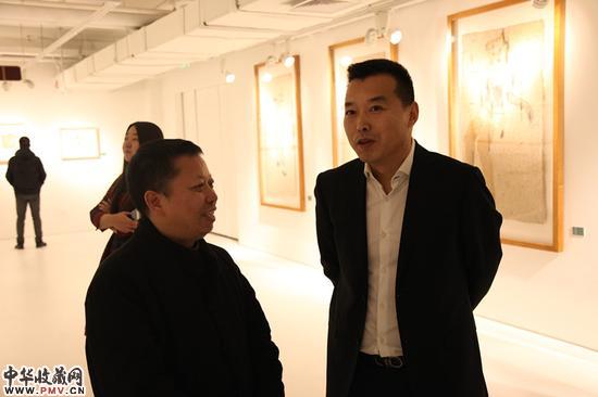 策展人陈子游先生与山水文园集团副总裁王军先生