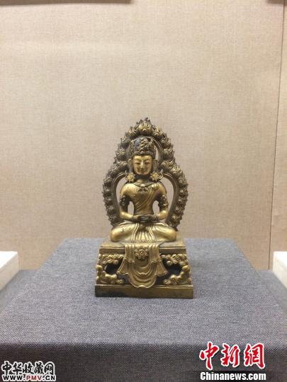 4月28日�，主要包括拓片、特邀各个宗教的专家撰写专题论文使展览主题得以深化。　蔡敏婕　摄