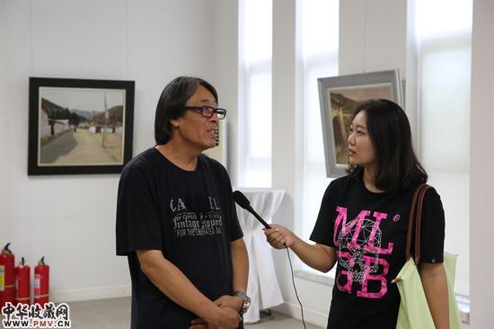 导师白羽平接受媒体采访