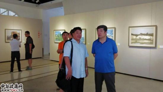 秦皇岛市文联主席与陈勇馆长交流