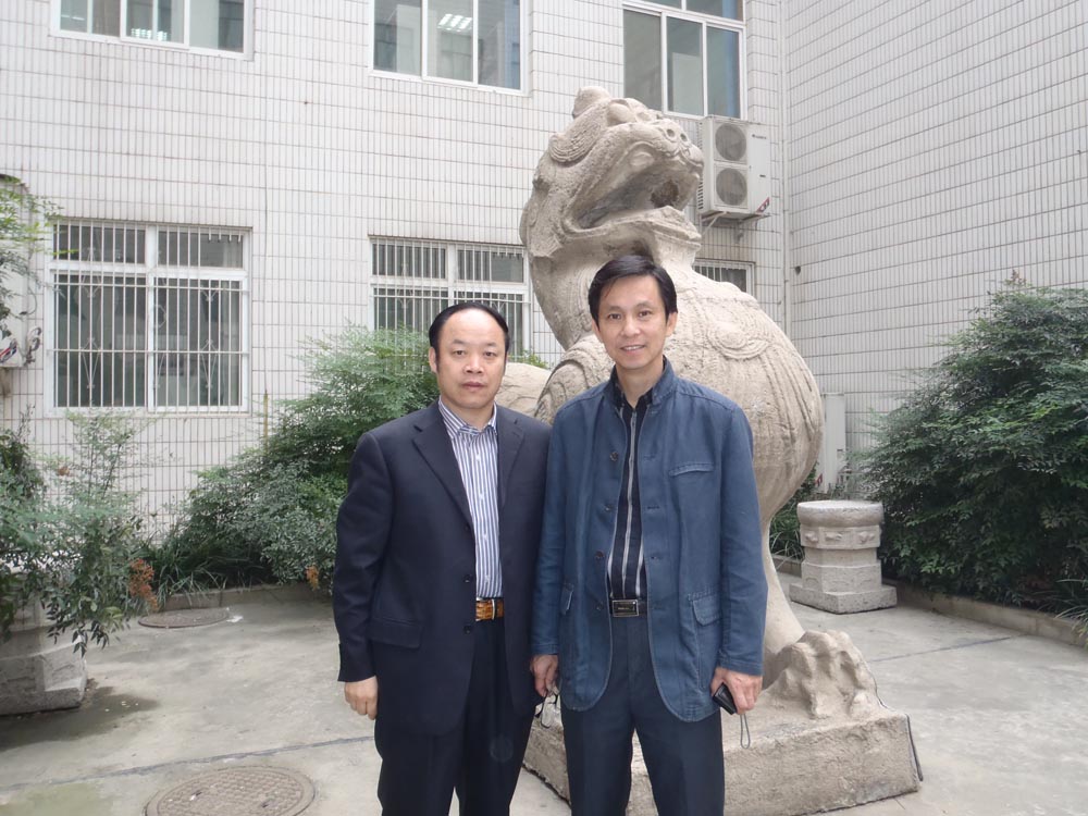 谢辉与何家英先生在西安美术学院