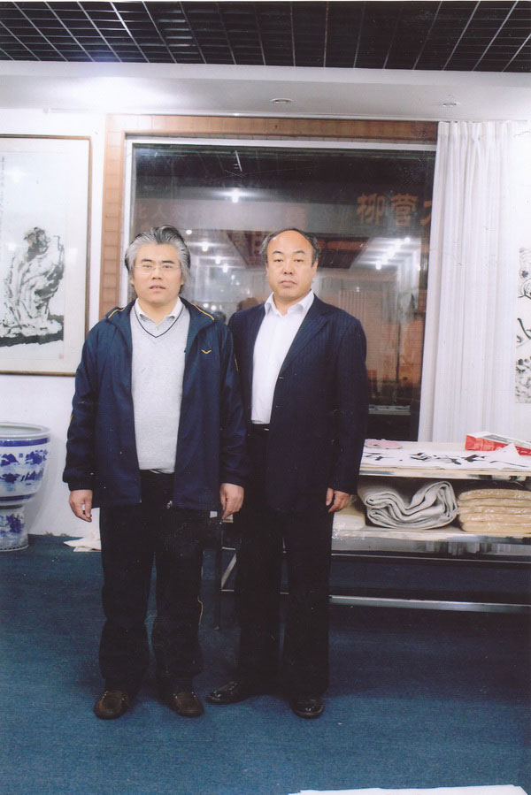张孝勇与中国陕北书画院院长曹治国合影