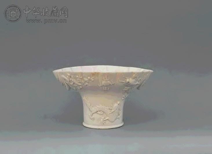 明 德化白瓷龙虎图盏杯