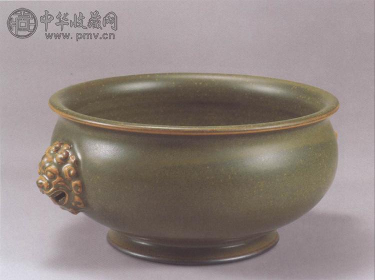 清乾隆 鳝鱼黄釉狮耳炉