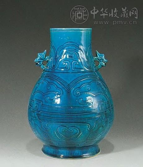 清 孔雀蓝印龙纹双耳尊